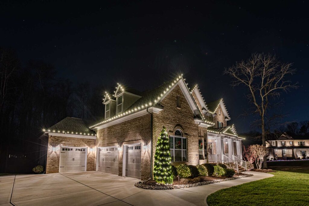 Cobb County Christmas lights on a brick home